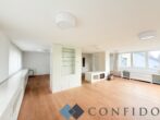 Exklusive Maisonette mit traumhaften Terrassen und unverbaubarem Grünblick in absoluter Ruhelage - Wohnzimmer