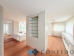 Exklusive Maisonette mit traumhaften Terrassen und unverbaubarem Grünblick in absoluter Ruhelage - Wohnzimmer