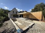 Kurz vor der Fertigstellung - LUXUSVILLA MIT POOL, LIFT & WELLNESS - Zeitlose Architektur für höchste Ansprüche - Hausansicht gartenseitig